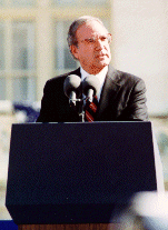 Mitchell giving a speech, 1994
