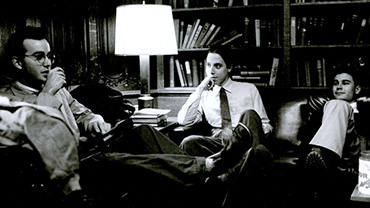 1990. Students relaxing in the reception room, Gibson Hall.