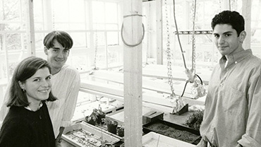 1995. Students observing plants in Searles Science greenhouse.