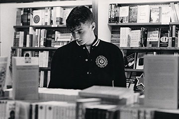 Student Browsing Book Shelves